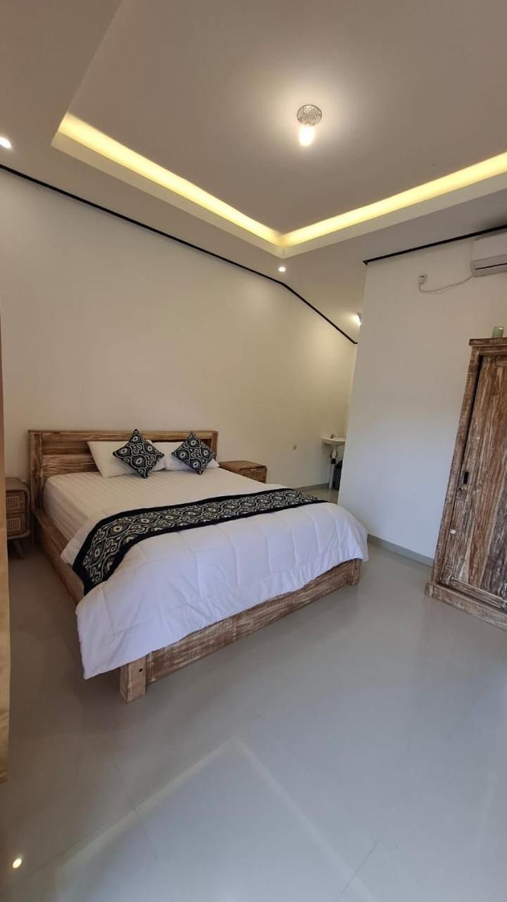 Raditya Homestay Mambal Bagian luar foto